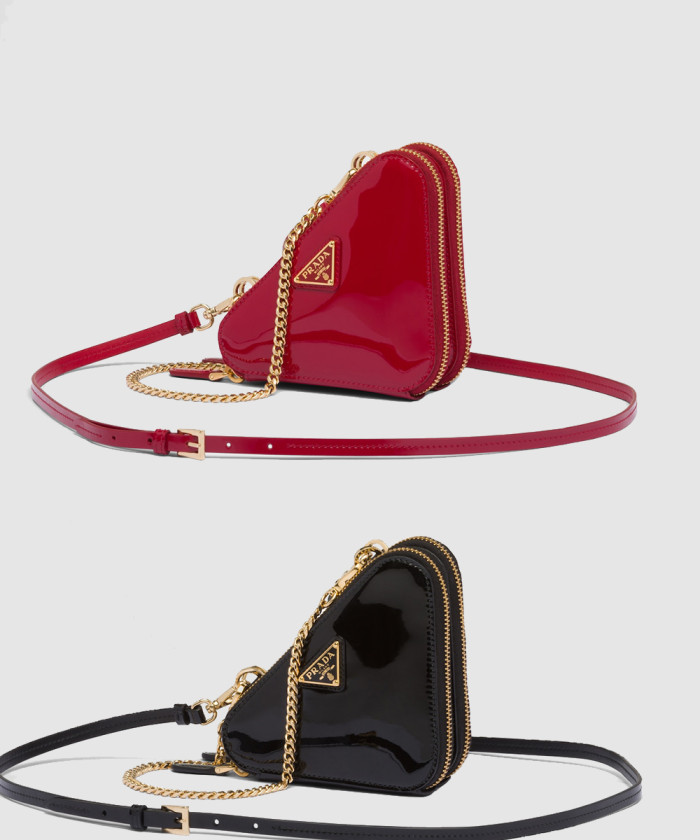 [PRADA-프라다]트라이앵글 페이턴트 가죽 미니 파우치 1NR015